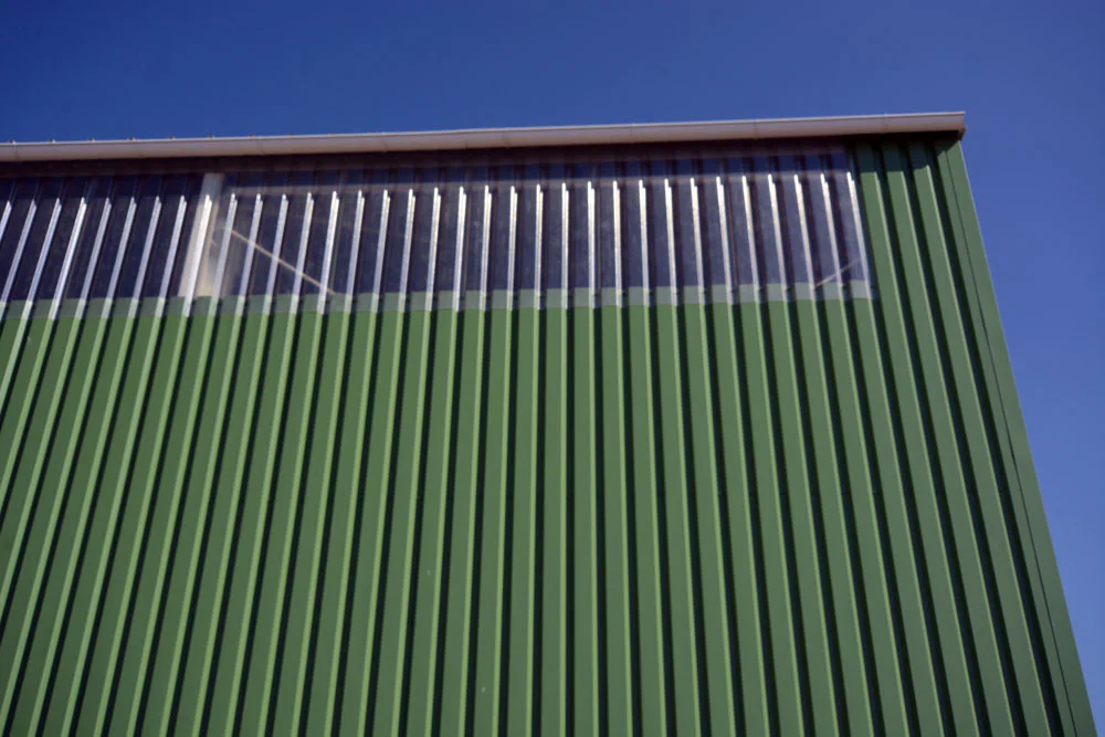 Cladding with sheet metal